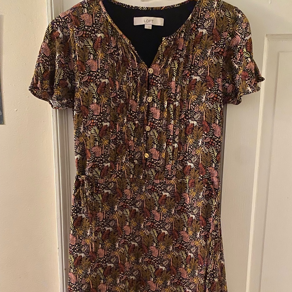 Fun, lined dress with vibrant animal prints. LOFT